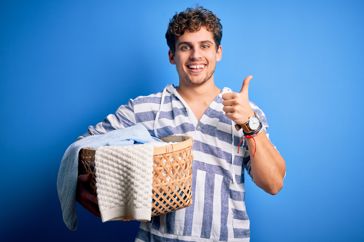 Man With Laundry Basket Thumbs Up 1200X800